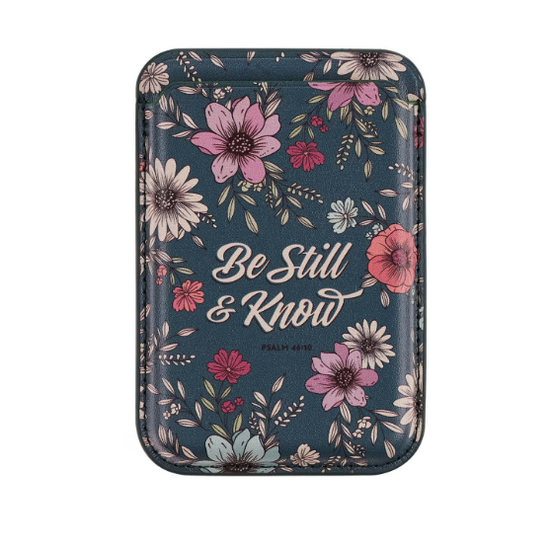 Cartera adhesiva para teléfono en piel sintética teal con flores y el texto Be Still & Know