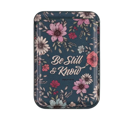 Cartera adhesiva para teléfono en piel sintética teal con flores y el texto Be Still & Know