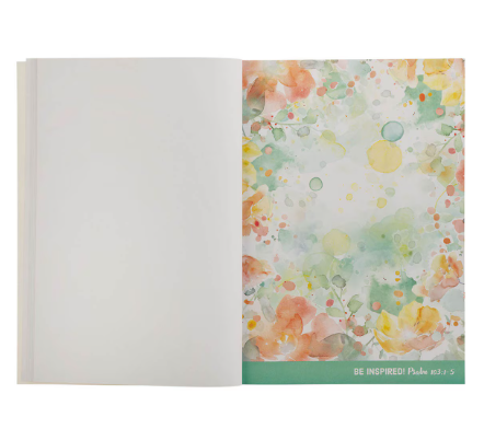 Open spread with a green and orange watercolor page ready to doodle on